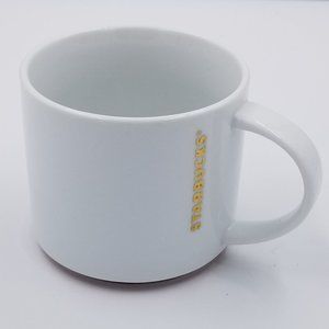 Starbucks 2012 Stackable 16 fl. oz. Mug Gold Logo White With Red Stripe